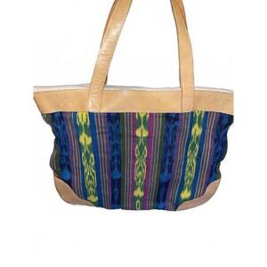 Authentic Guatemalan bag by L. Fernando’s. Leather handles, zip closure.